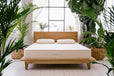 Natural latex mattress surrounded by plants
