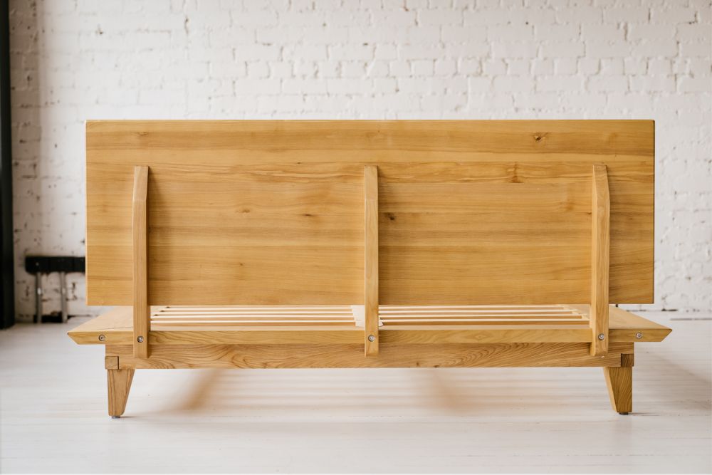 Rear view of the Peace Lily Timber Bed Frame showing the detachable headboard and its mounting brackets