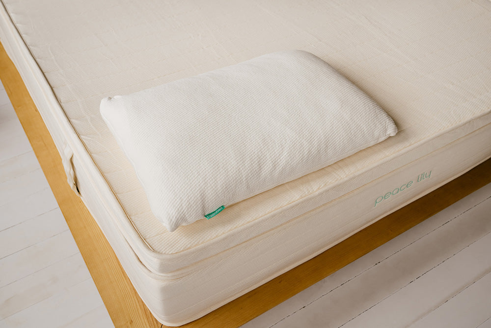white natural kapok pillow